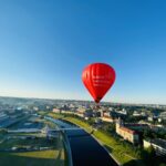 hot_air_balloon_taking_off_from_white_bridge_vilnius